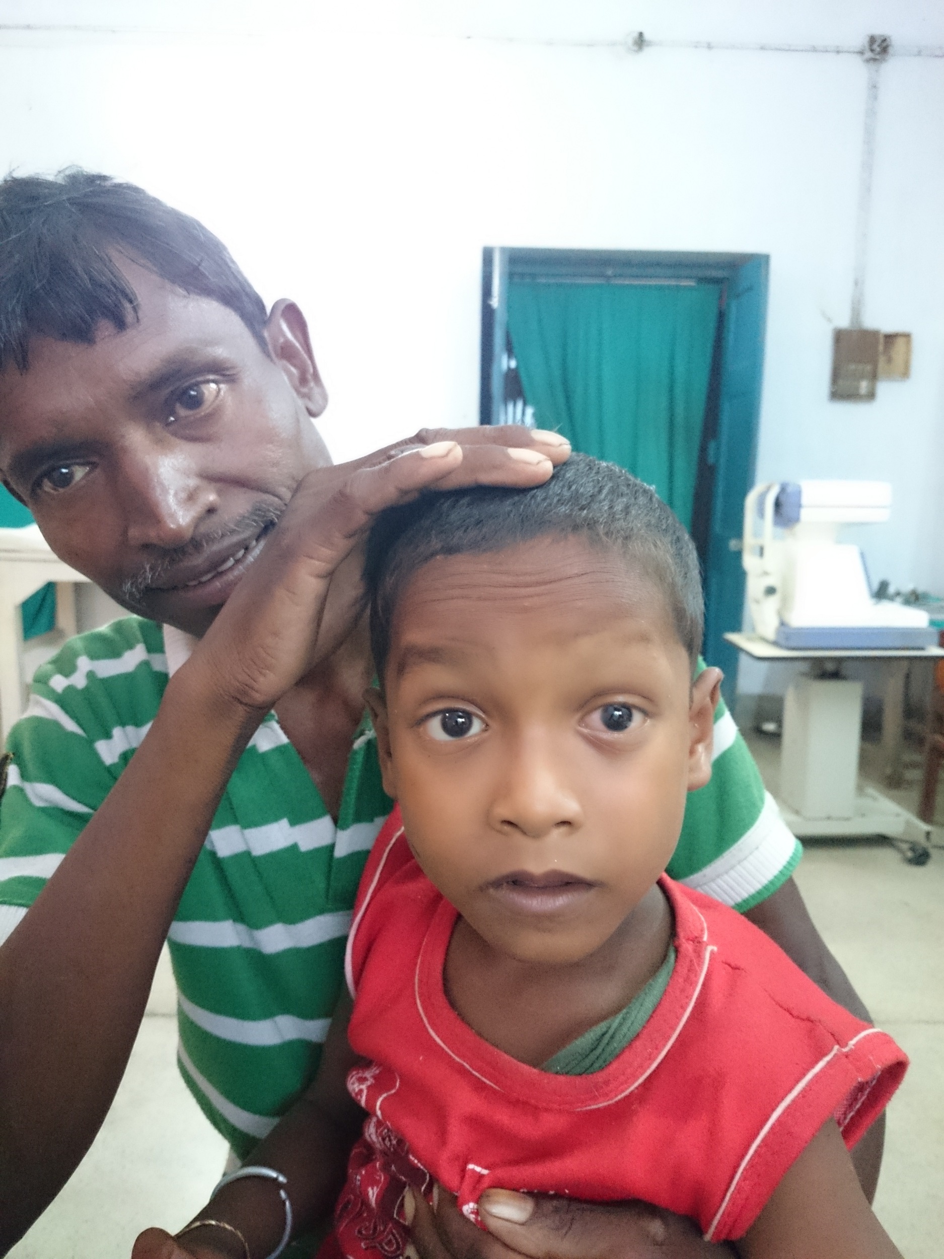 Sibdhan with Dad after surgery.JPG